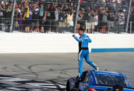 Denny Hamlin celebrates after winning the Autotrader EchoPark Automotive 400. Source: Imagn